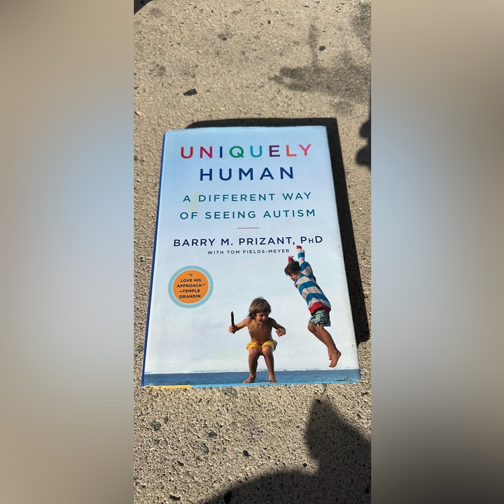 BOOK UNIQUELY HUMAN LIKE NEW